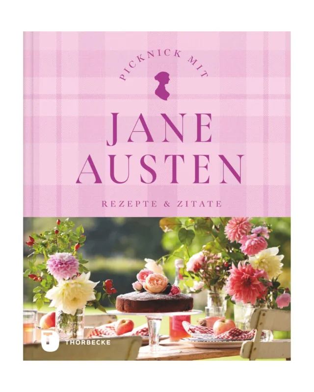 Das Buch "Picknick mit Jane Austen | Rezepte & Zitate" aus dem Patmos Verlag erinnert mit seinem pinkfarbenen, karierten Einband und einer Tischszene im Freien an Jane Austens Picknicks und den Charme der englischen Teekultur.
